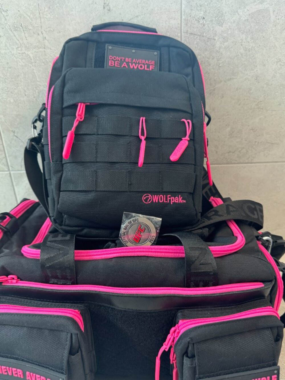 TWO BAGS. Wolfpak SET -20L Duffle and Sling Bag